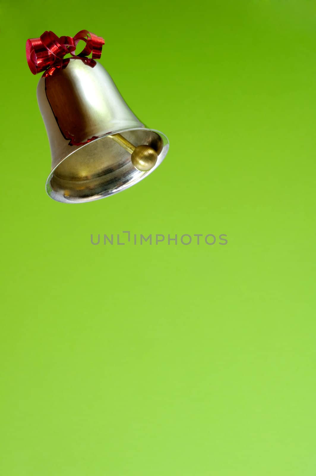 Ringing bell on graded green background by Bateleur