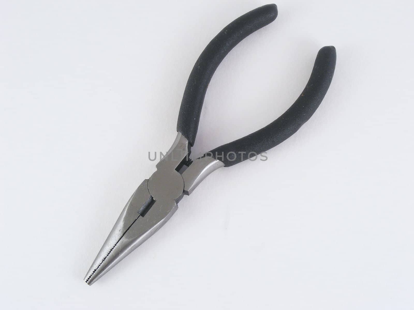 A pair of needle nose pliers.