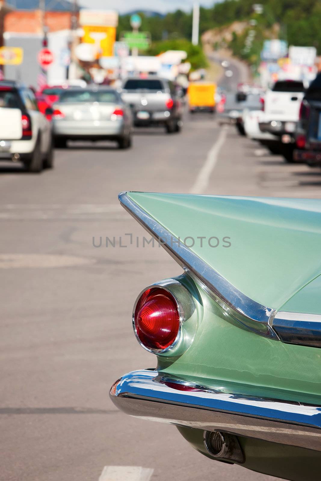 Tail fin on vintage car parked along Route 66