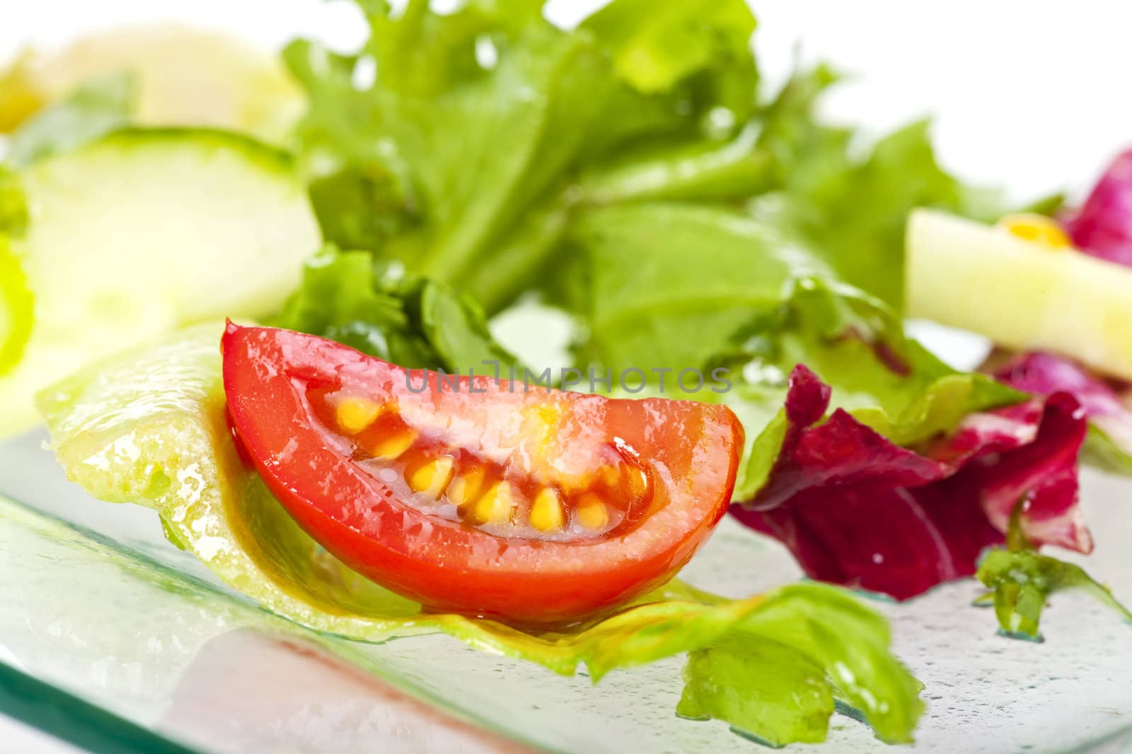 mixed salad on a glass plate