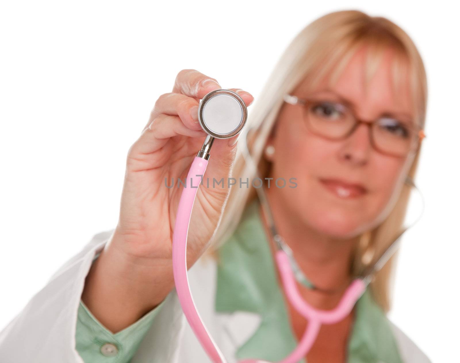 Attractive Female Doctor Holding Stethoscope by Feverpitched