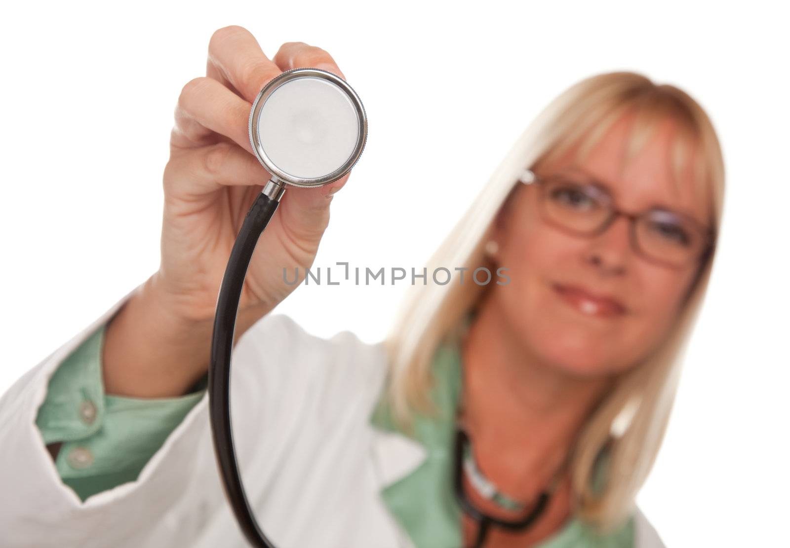 Attractive Female Doctor Holding Stethoscope Isolated on a White Background.