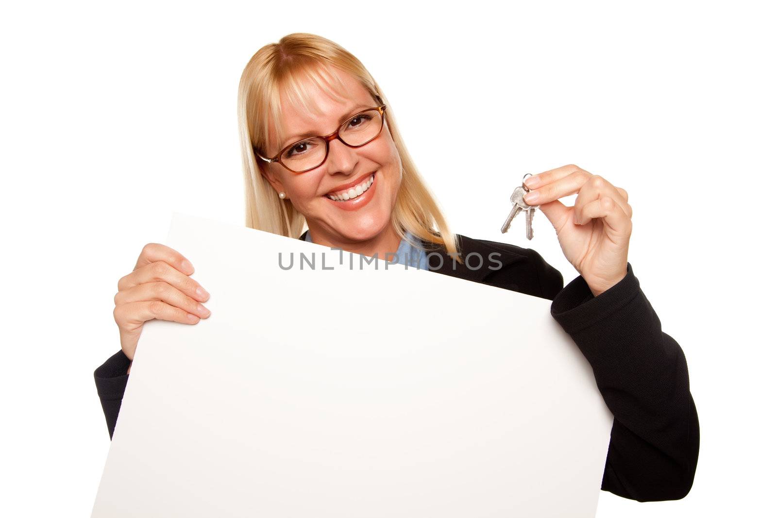 Attractive Blonde Holding Keys and Blank White Sign Isolated on a White Background.