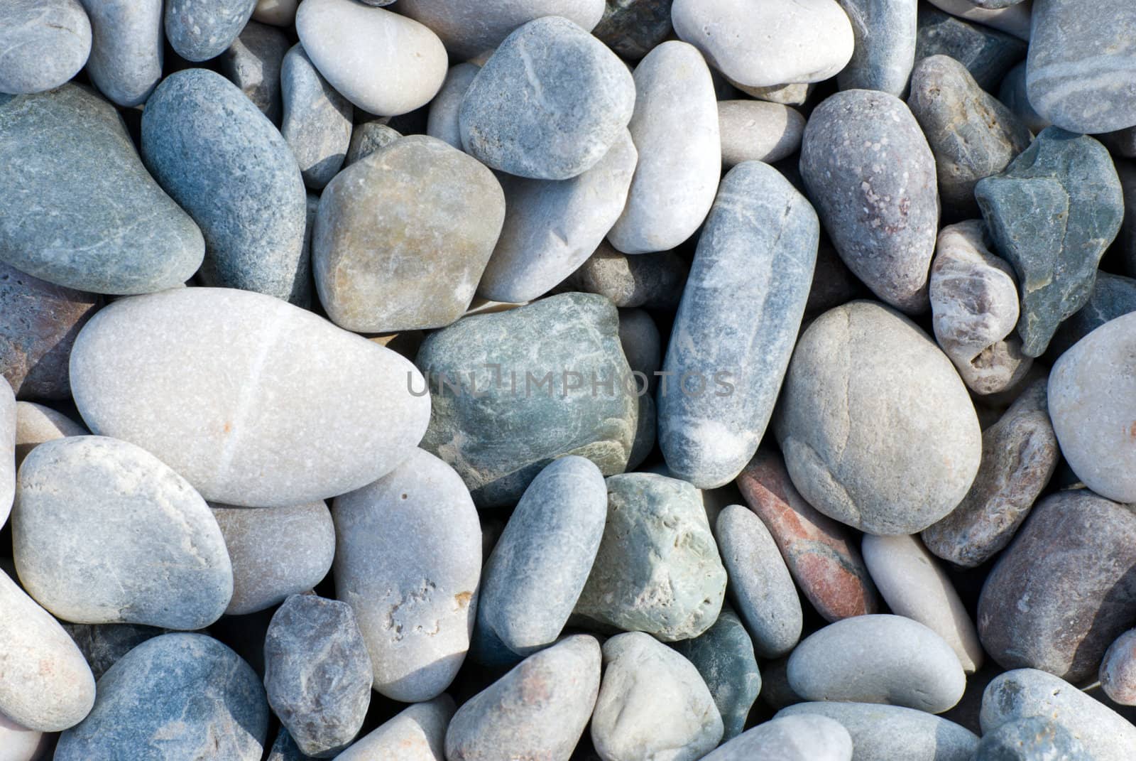 Texture of gray sea pebbles