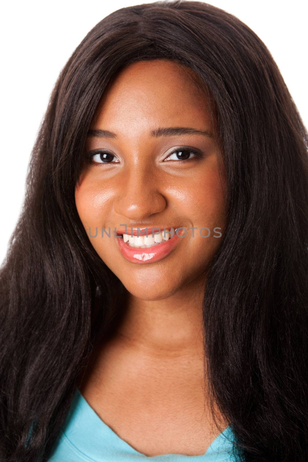 Face of a beautiful African Caribbean teenager girl with long black hair, isolated.
