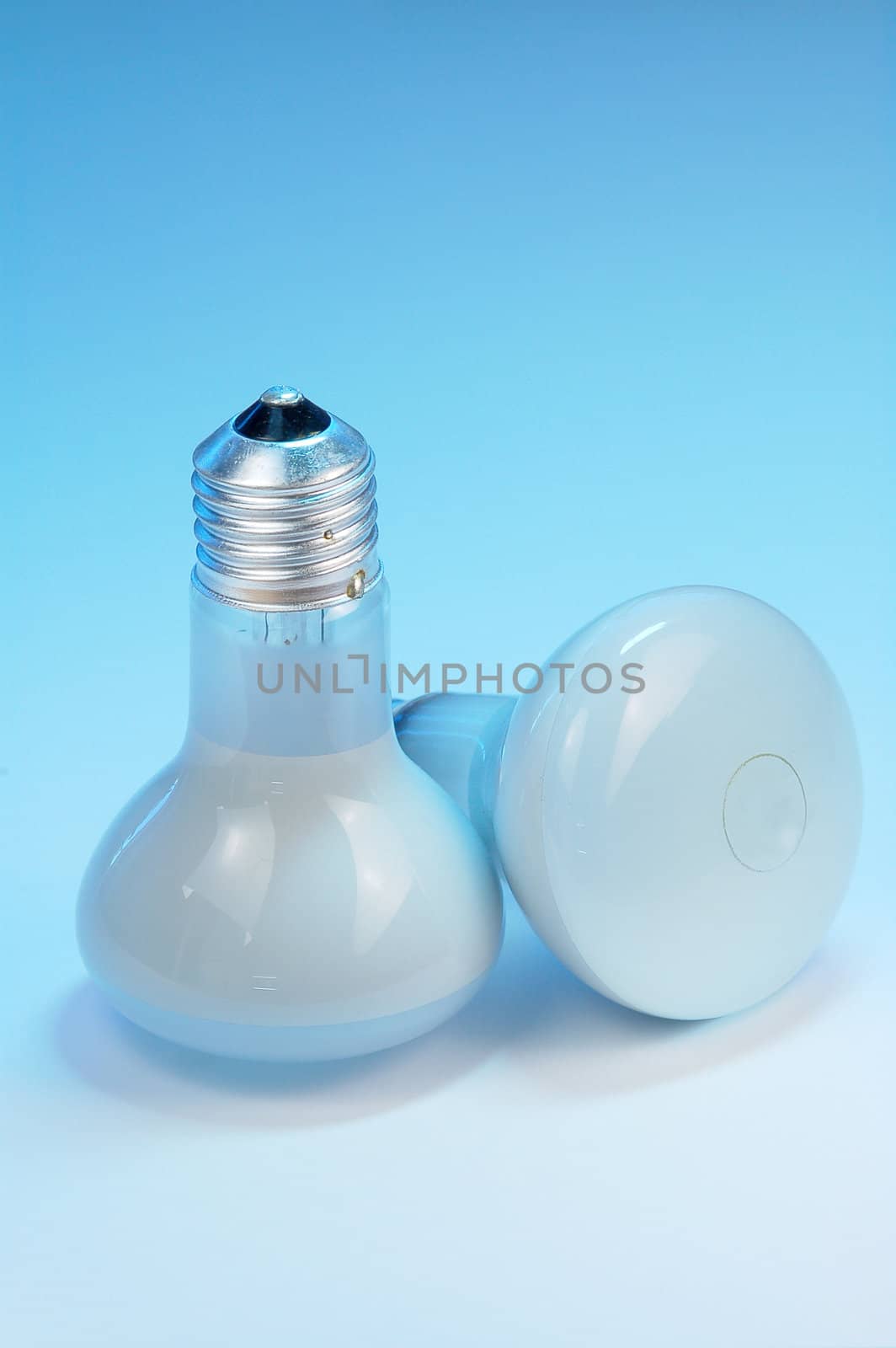 A light bulb isolated on blue background.