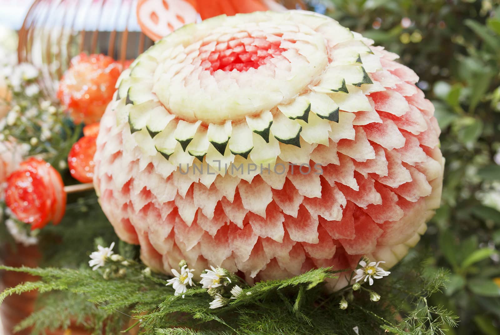 Thai art of watermelon carved into flower shapes