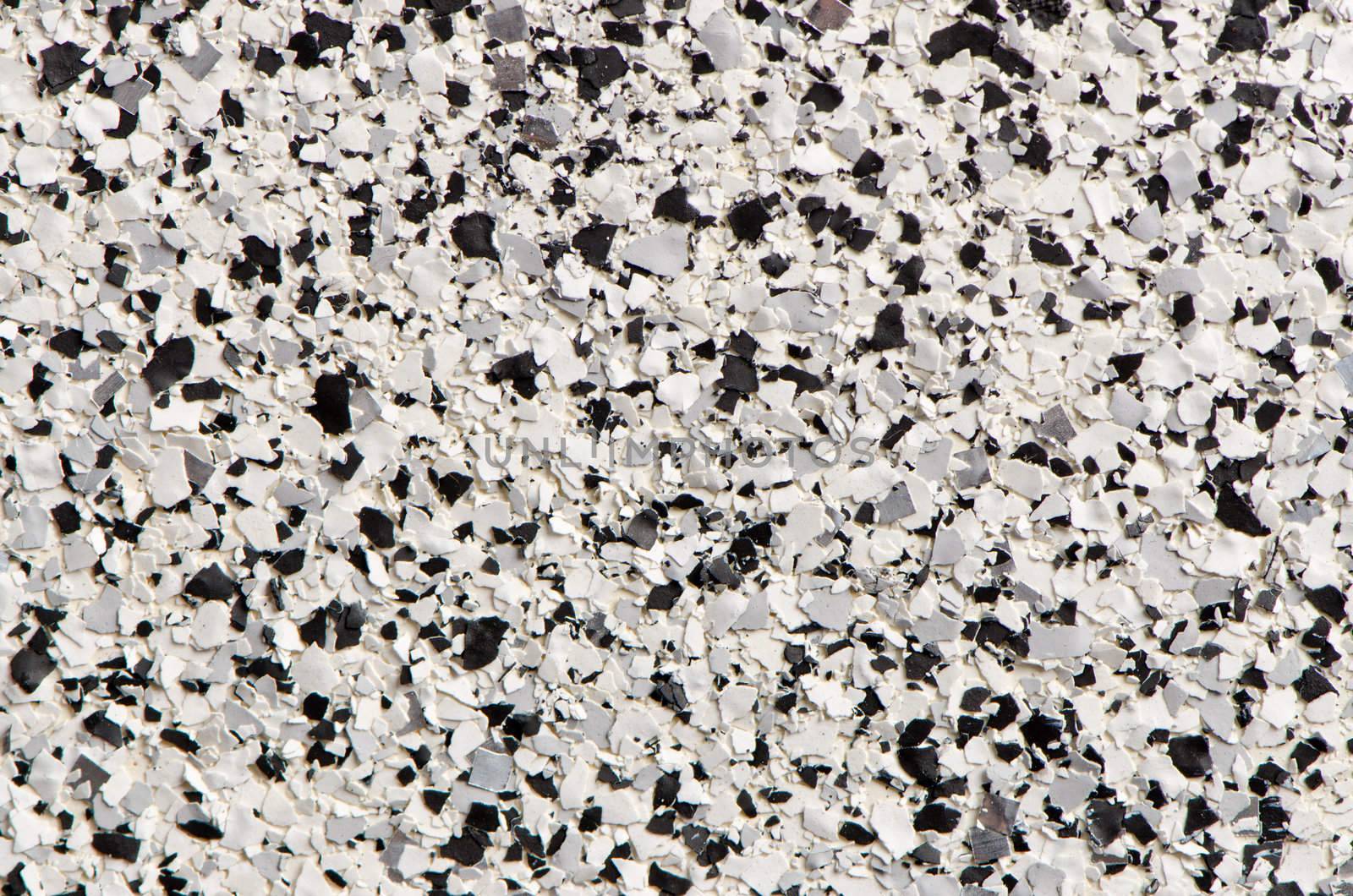 Artificial granite-like plastic texture.