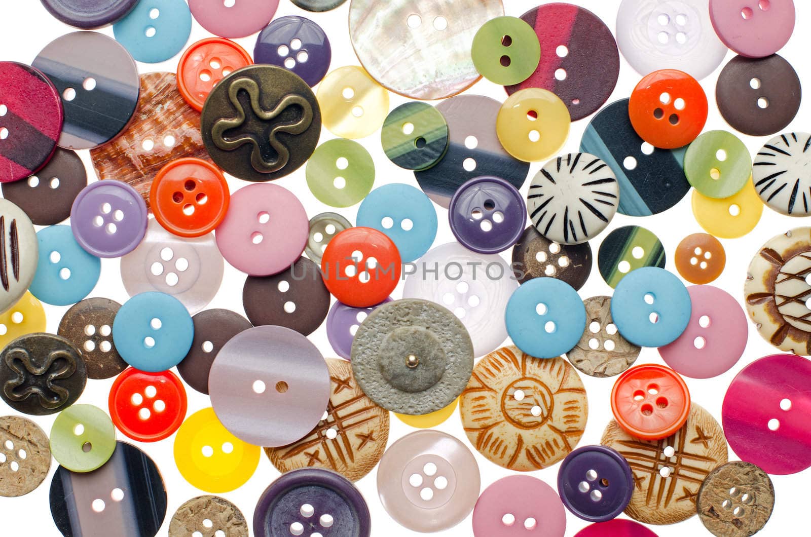 Top view of pile of sewing buttons background.
