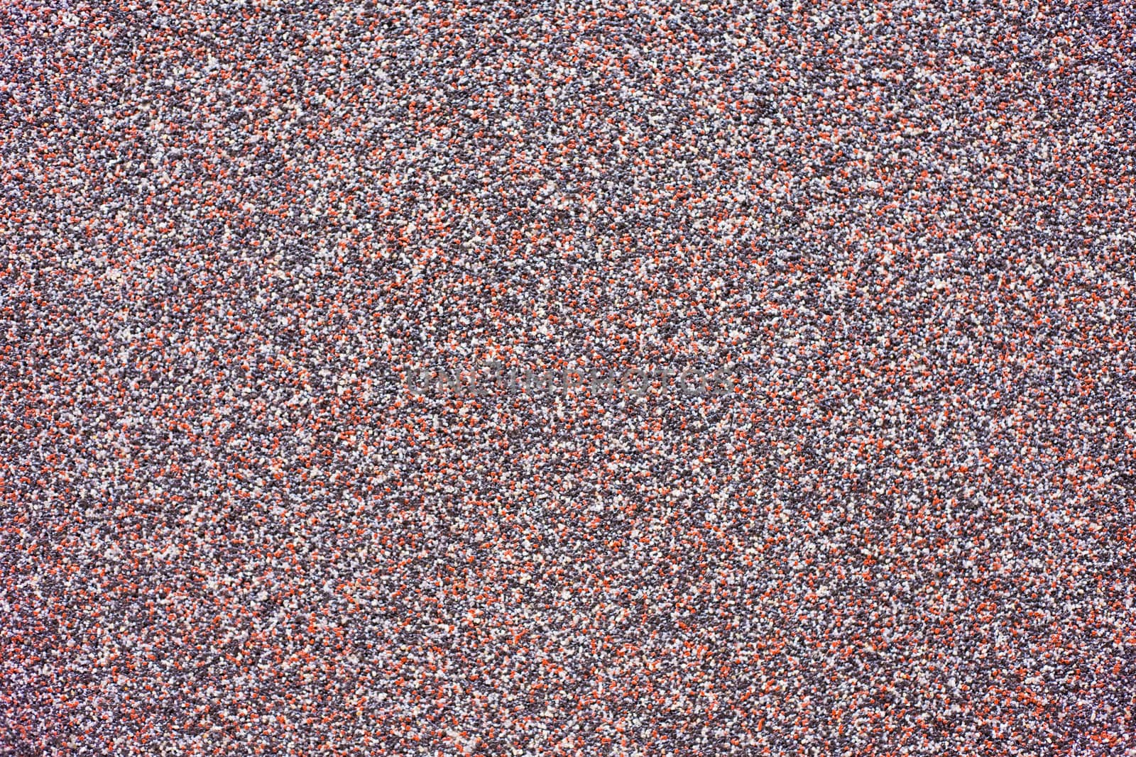 Colorful gritstone background texture pattern.