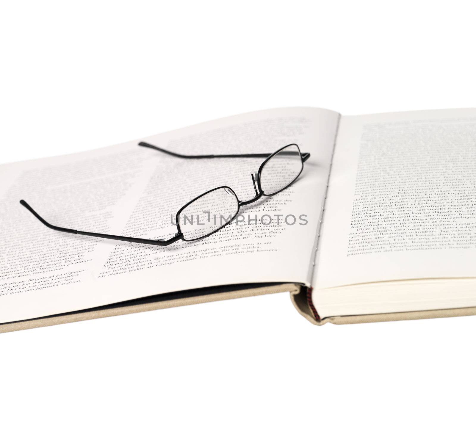 Glasses in a spread book by gemenacom