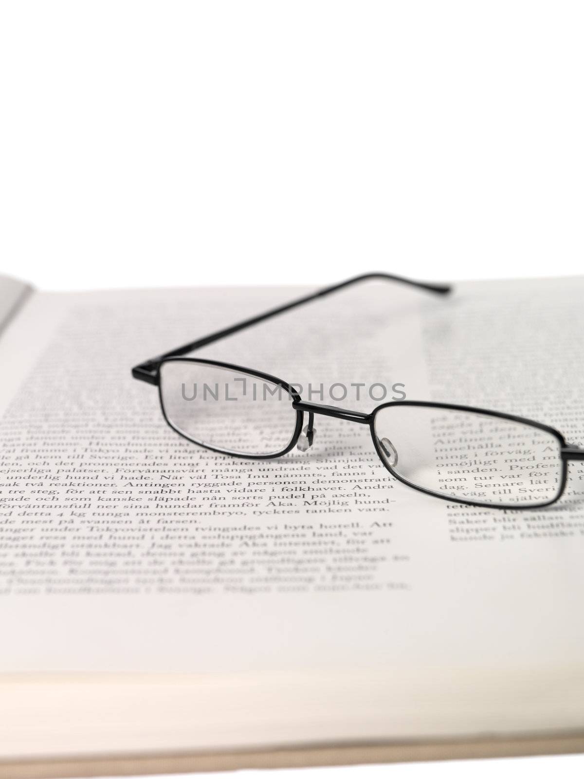 Reading-glasses in a spread book