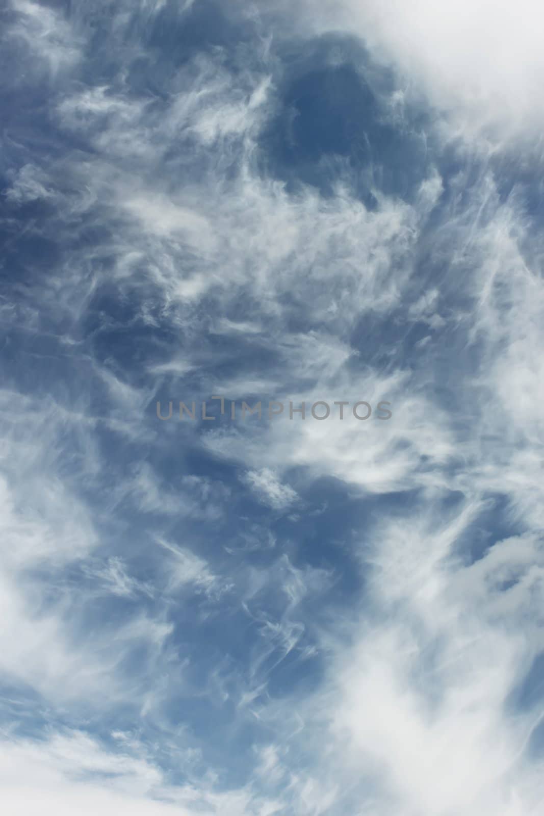 Heaven. Cloudscape of light white clouds, warm summer day