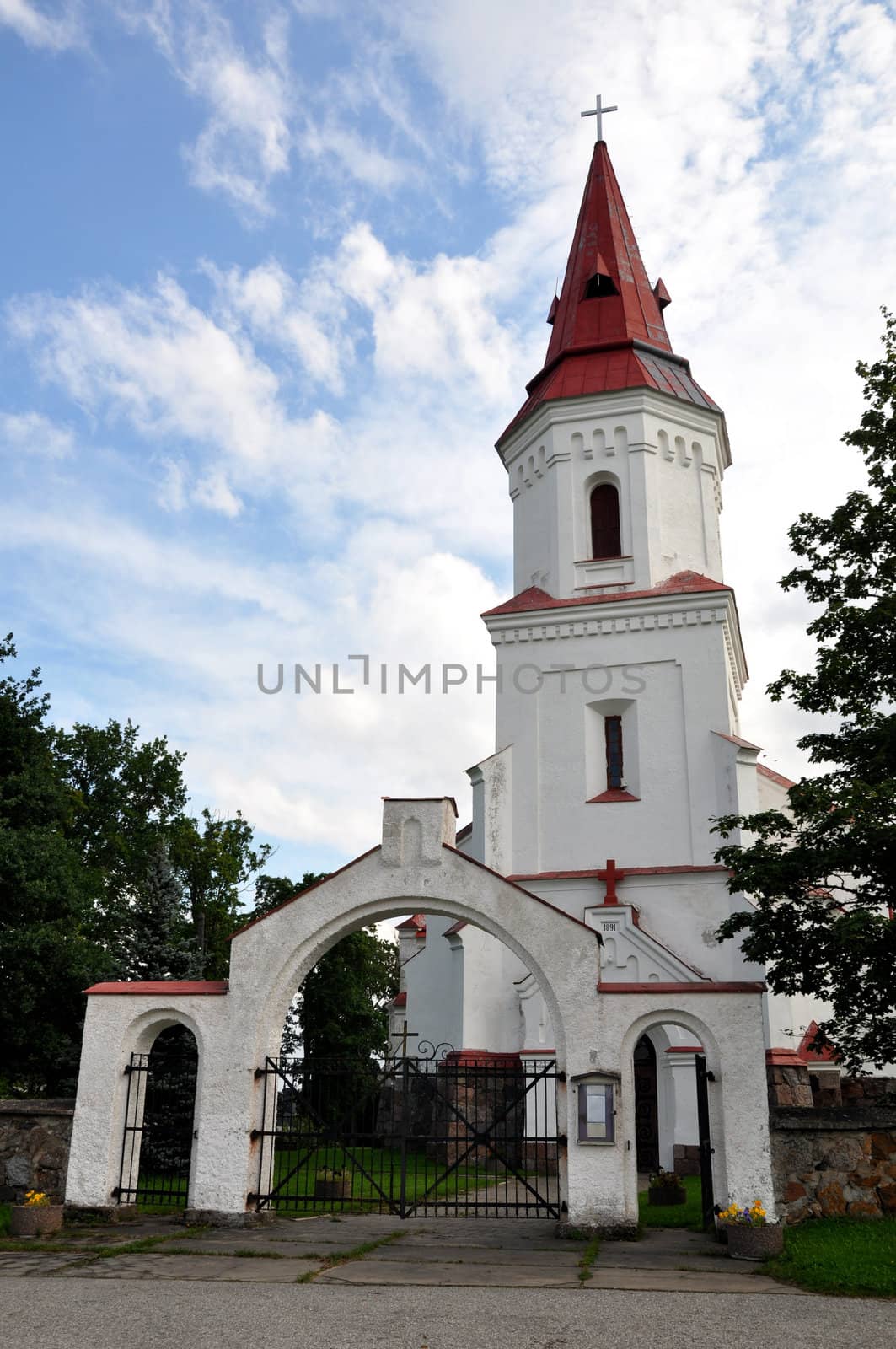 Estonia. Operating church on a background of the sky and clouds