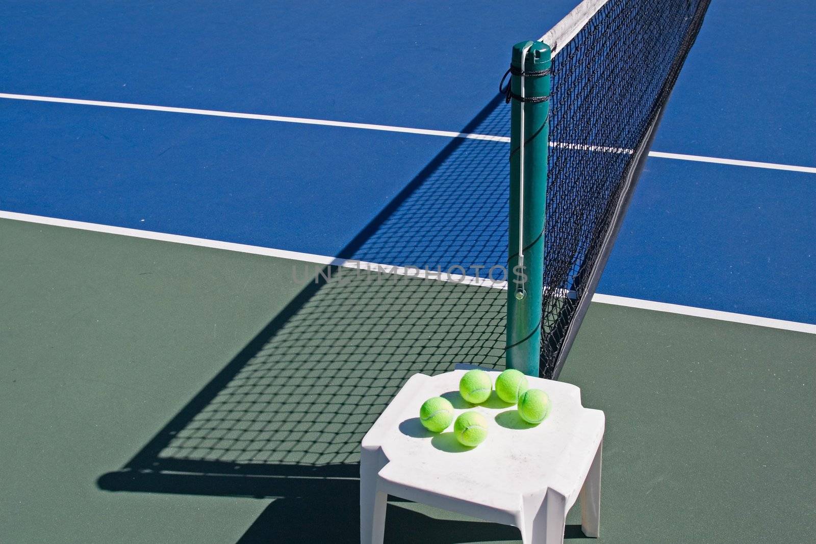 Resort tennis club and tennis courts with balls