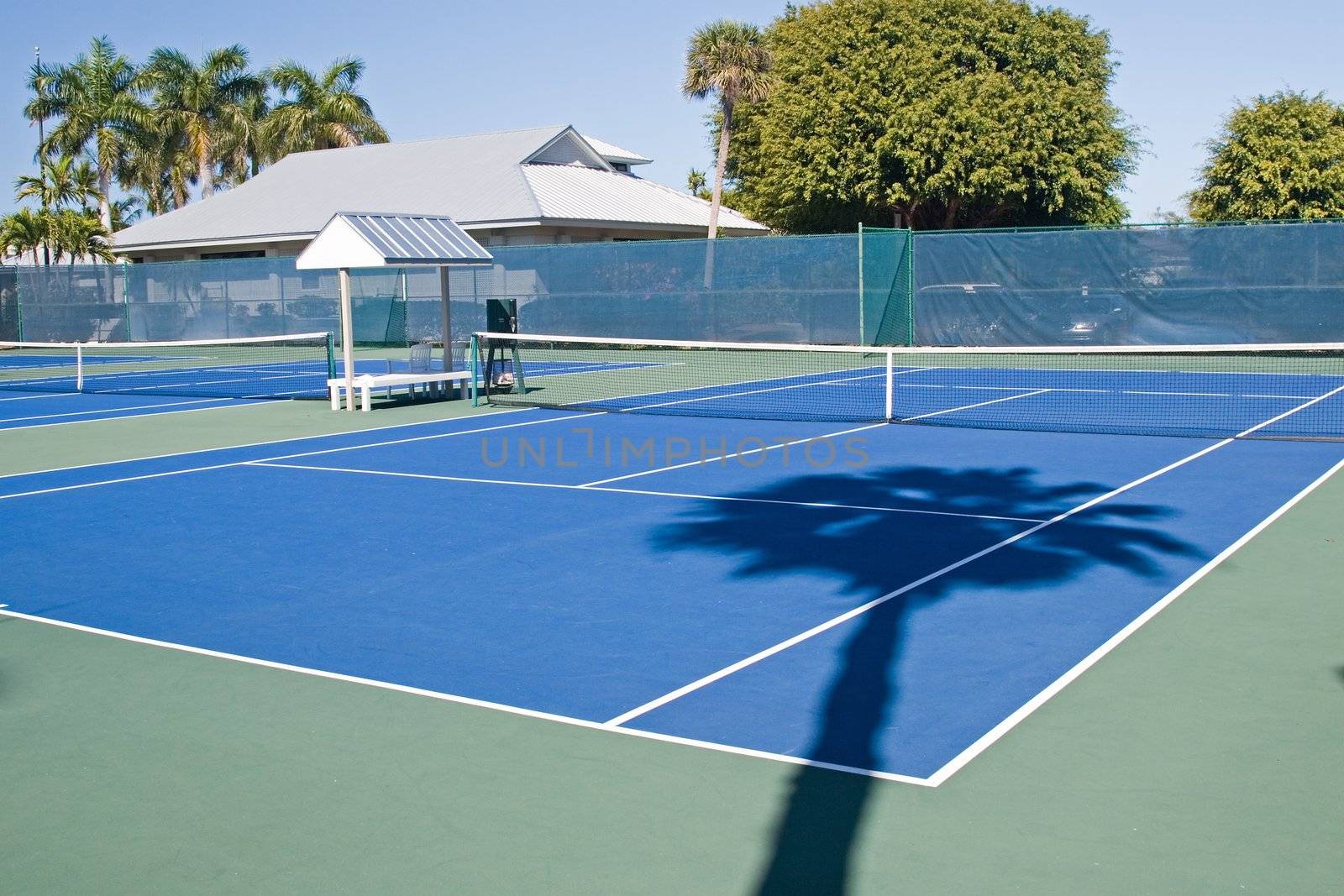 Resort tennis club and tennis courts with balls