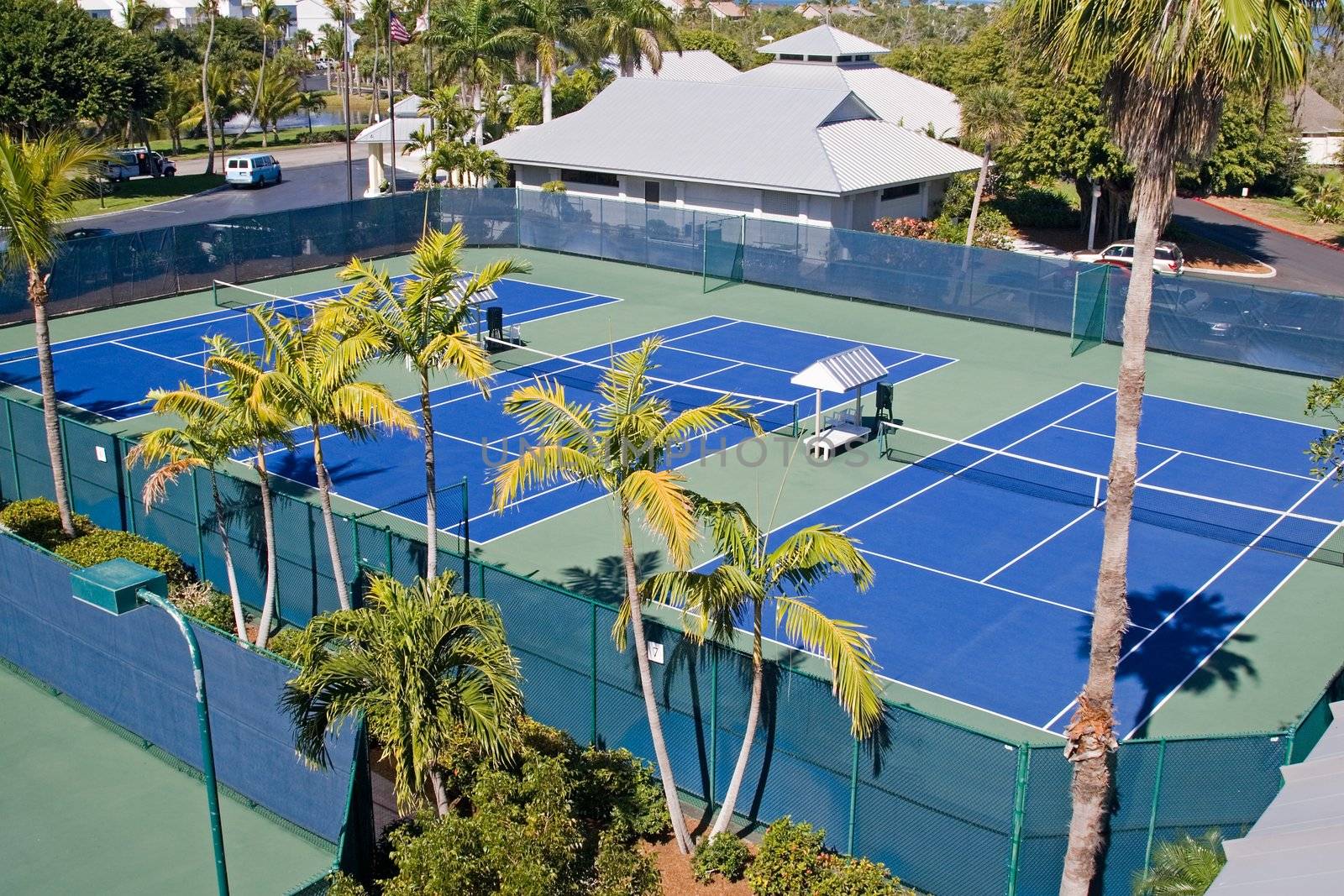 Resort tennis club and tennis courts with balls