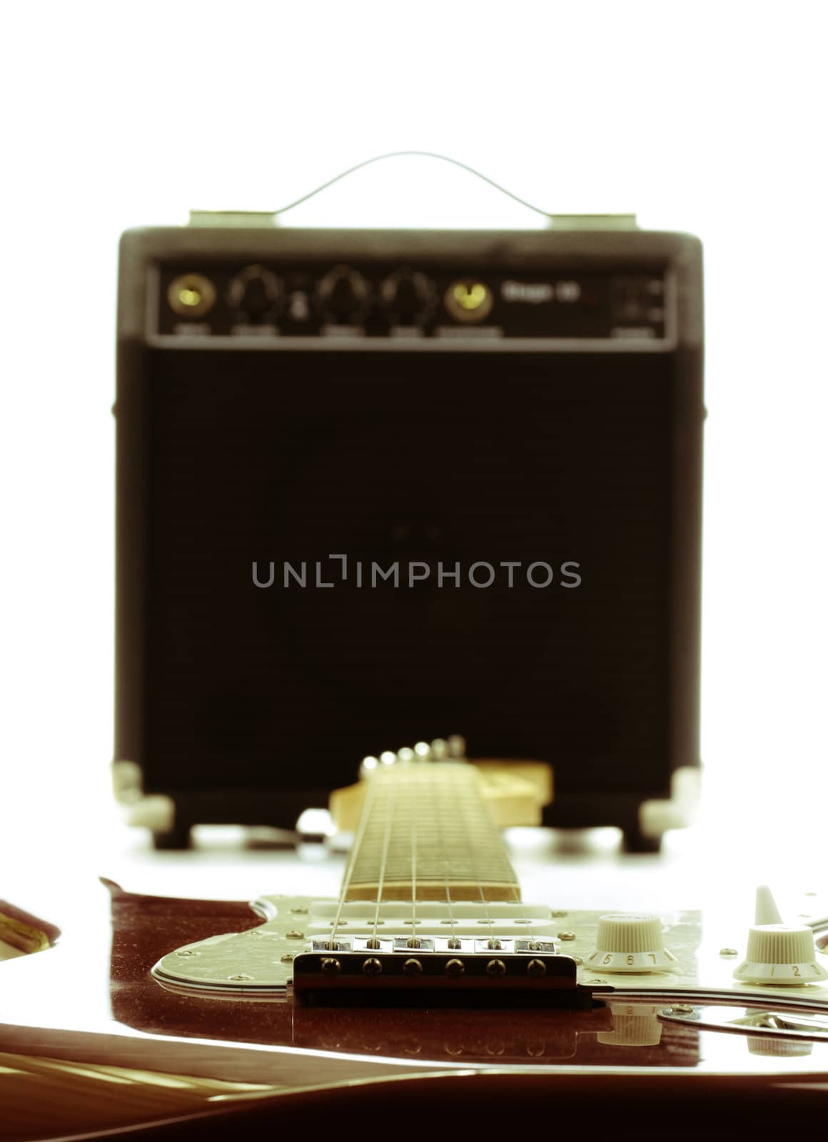 Electric guitar and amplifier isolated on the white backgroud
