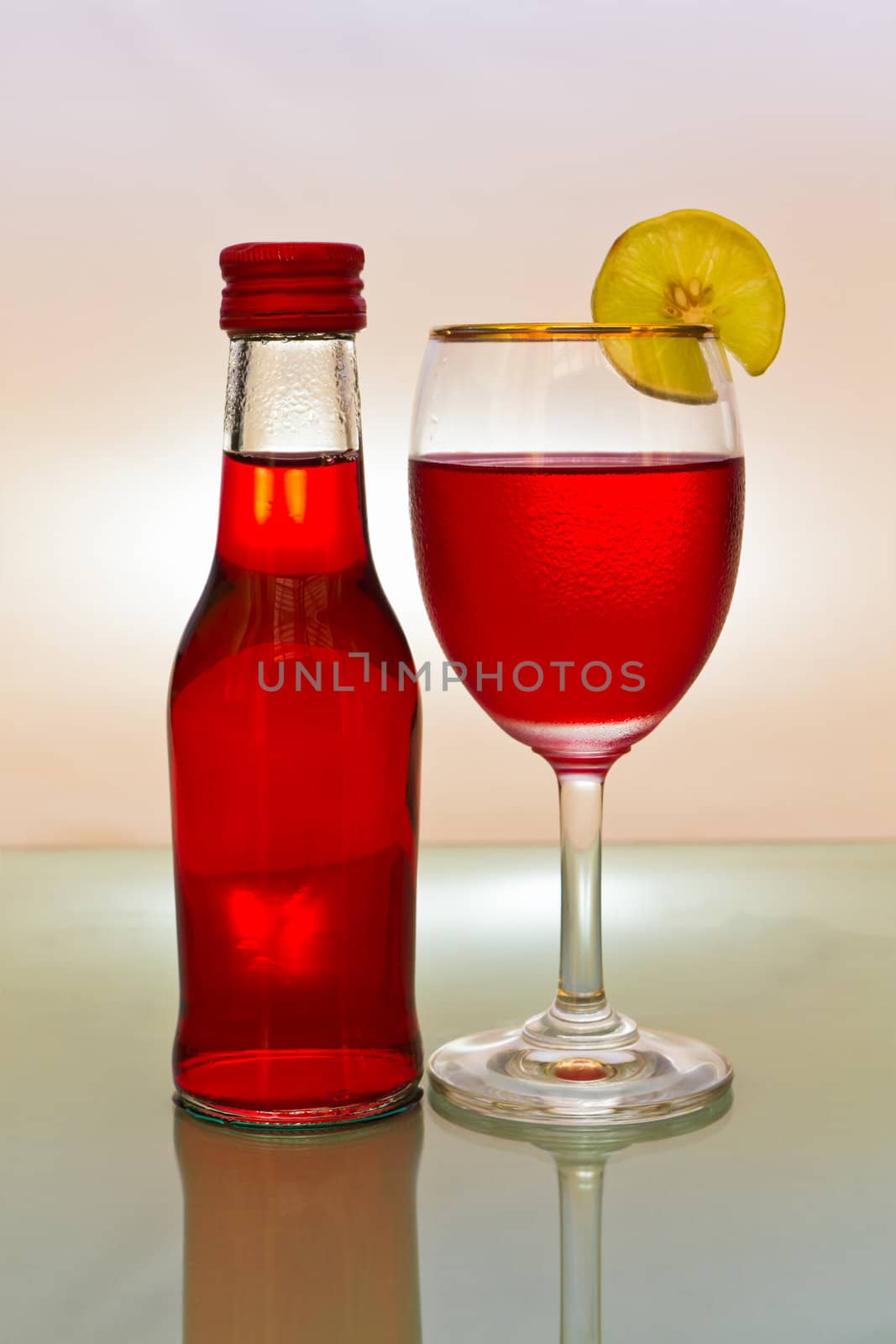 Red wine bottle and wine glass