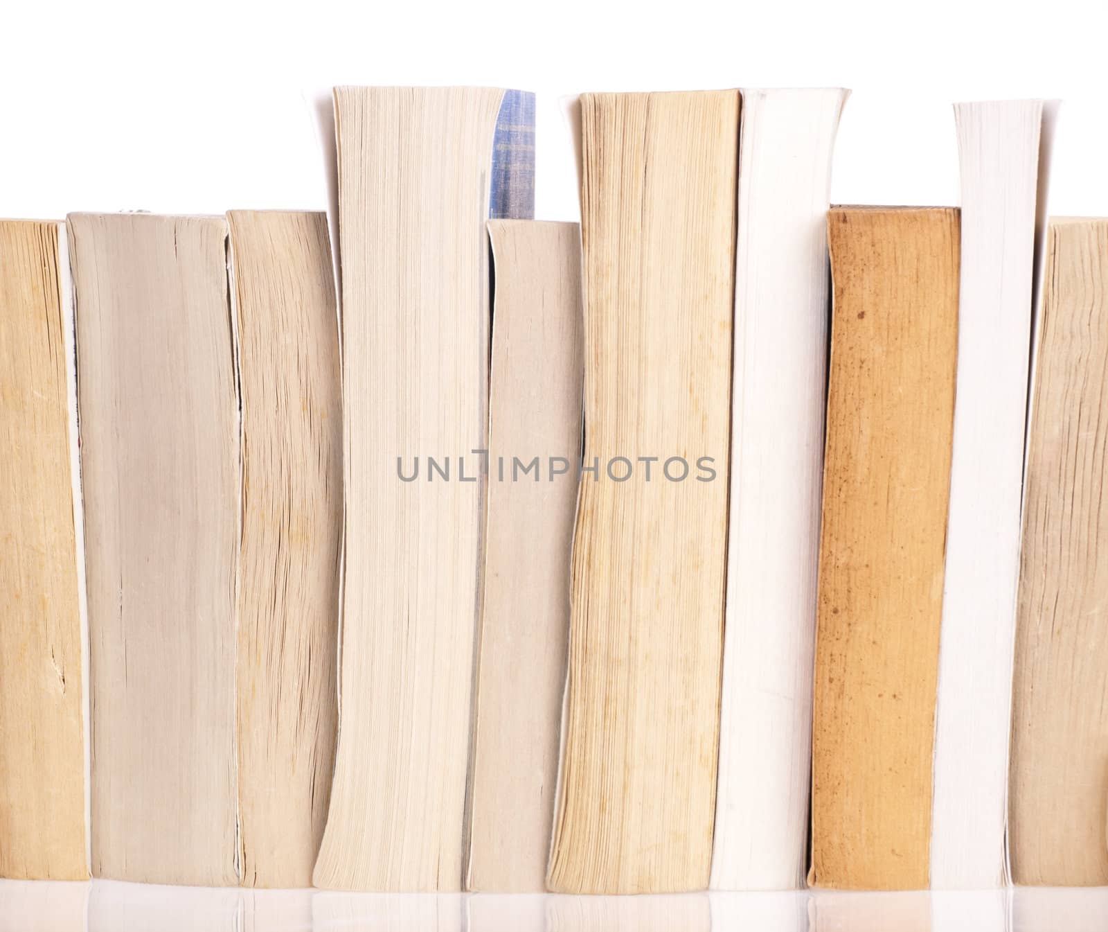 Stack of old books on a white background