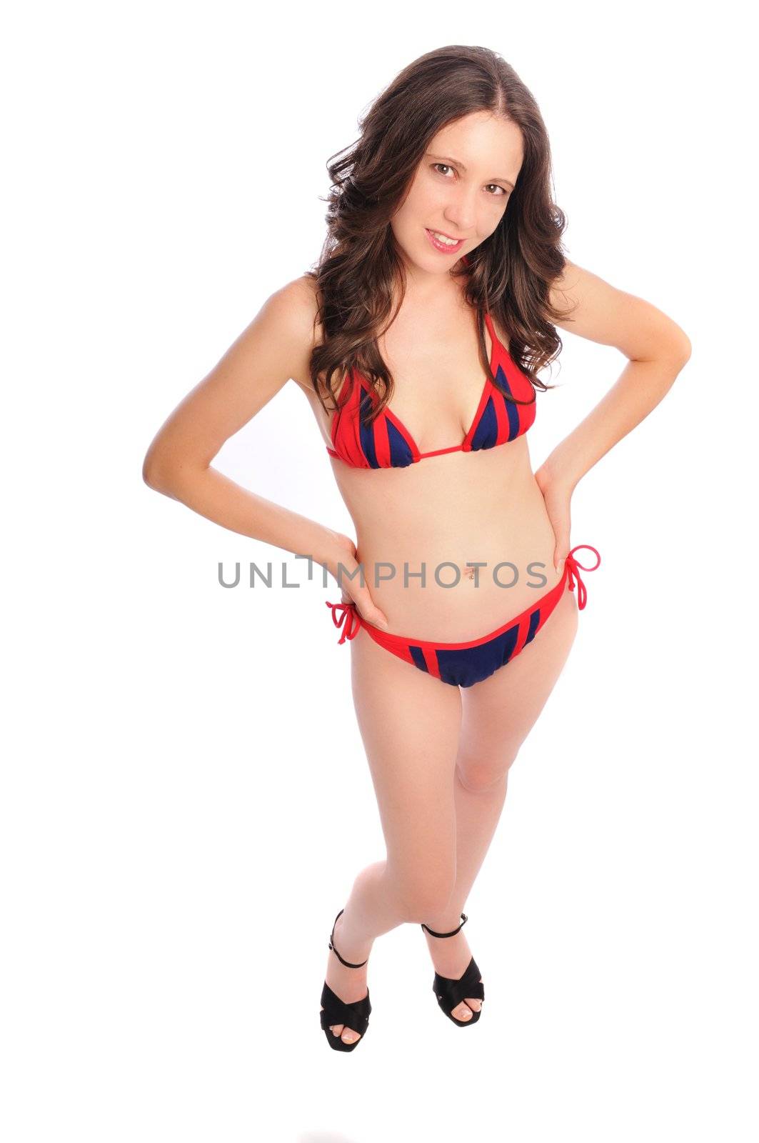 attractive young woman in a bikini on a white background