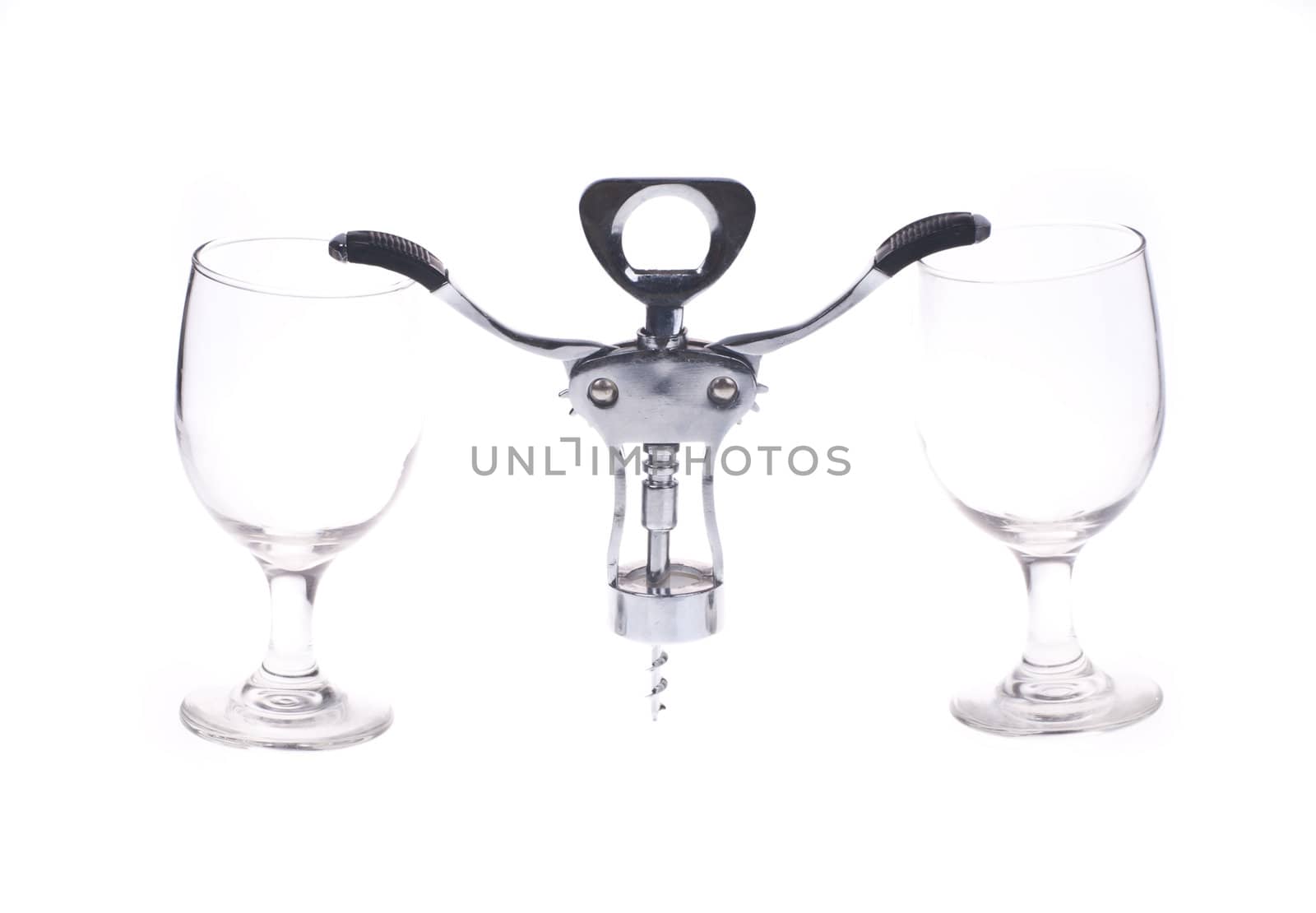 A background of empty glasses and a corkscrew.