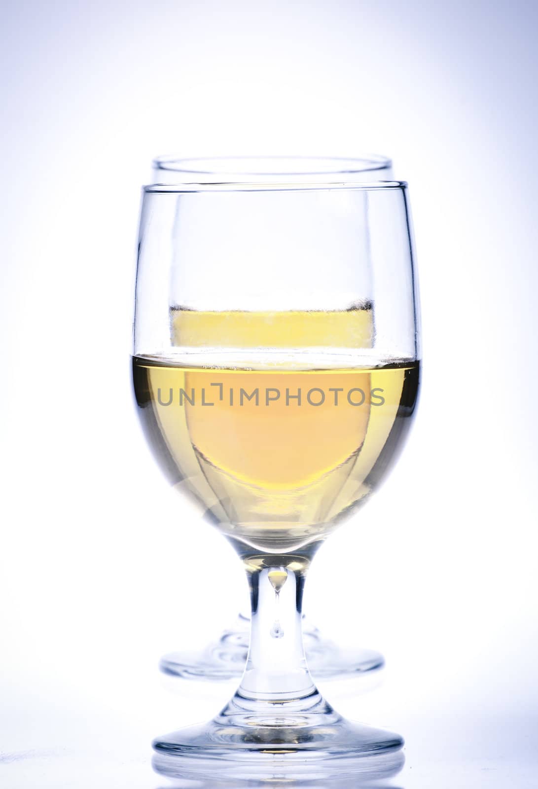 Two Glasses of white wine Isolated on a white background.