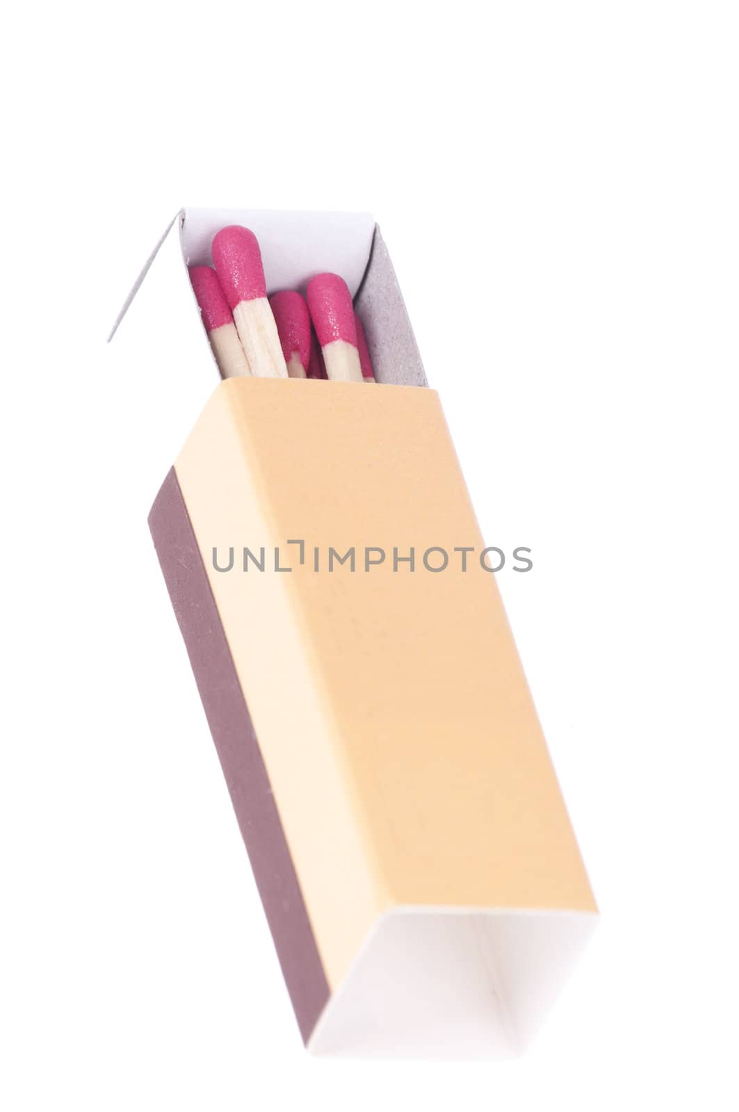 Matchbox with red matches isolated over white background