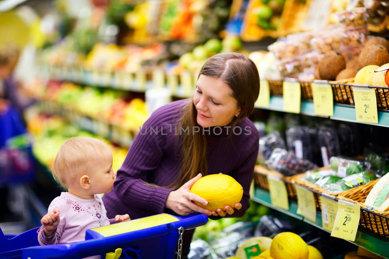 Family in supermarket by shalamov