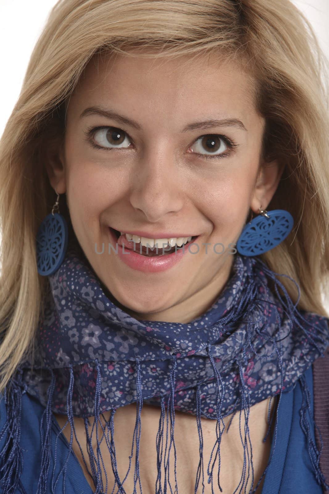 A smiling greeding girl with tounge tip