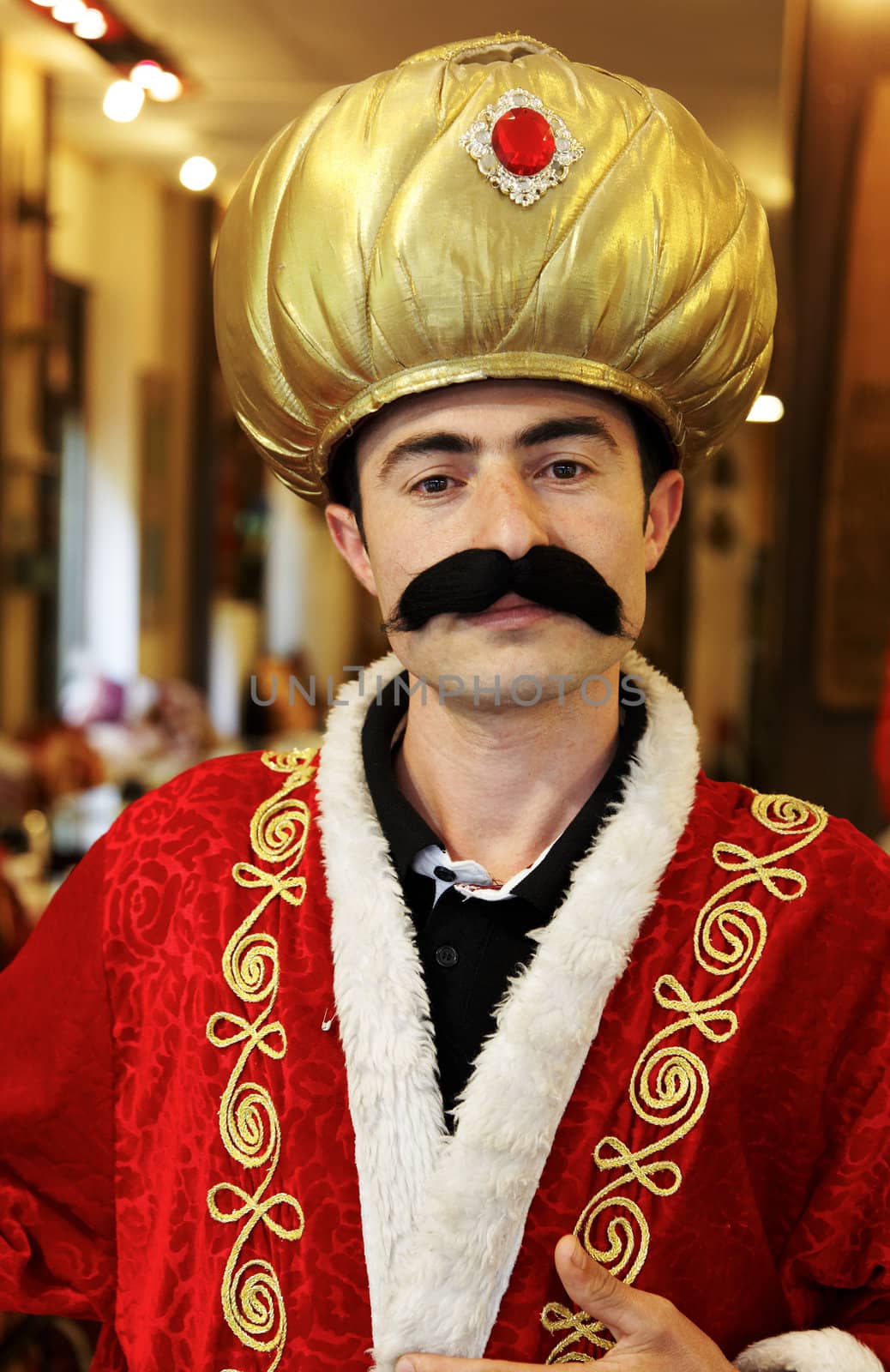 Istanbul, Turkey - June, 2011: Portrait of a Turkish waiter fancy dressed up as a sultan for a restaurant feature
