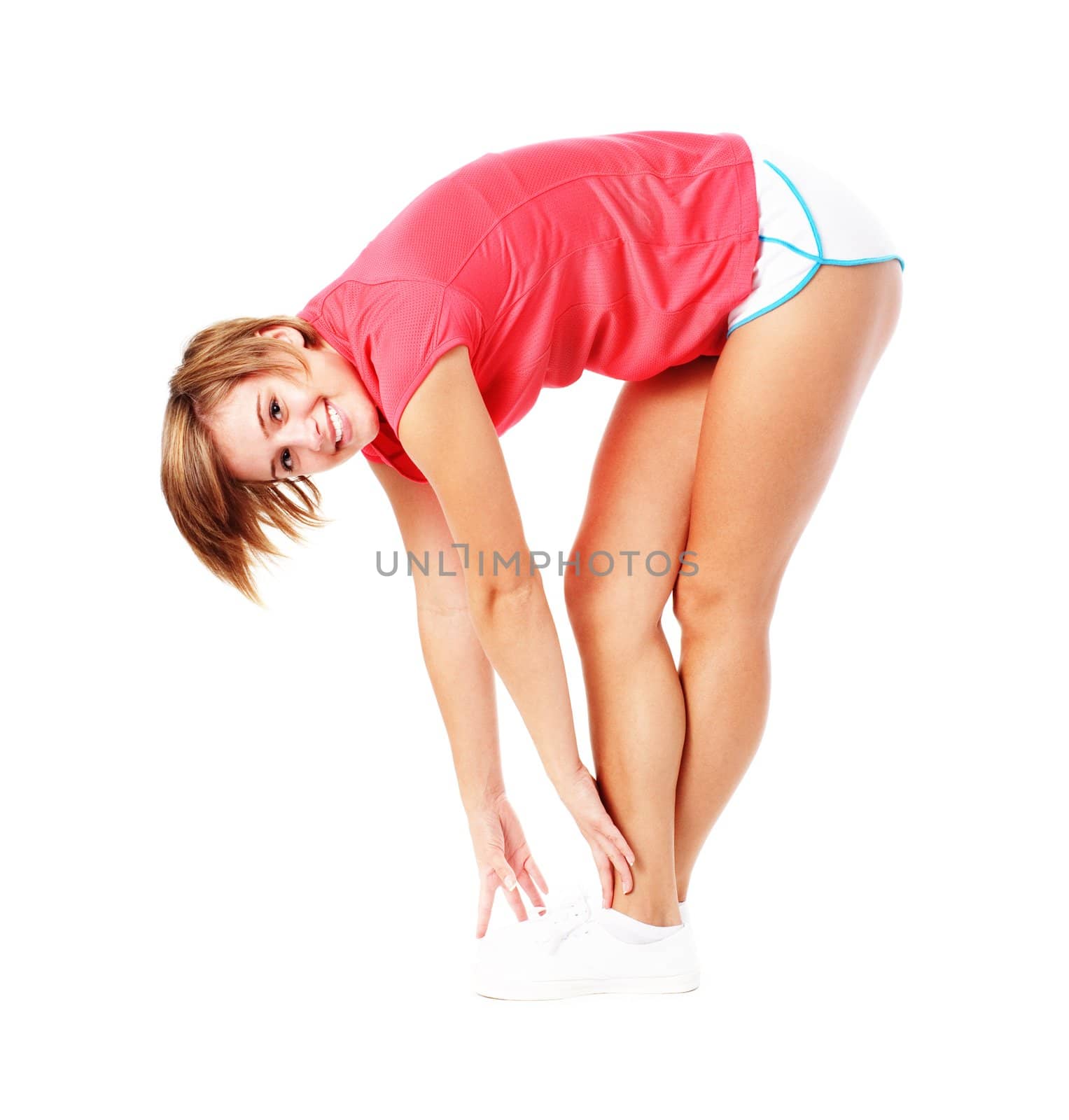 Young woman in red shirt stretching, isolated on white, from a complete series of photos.