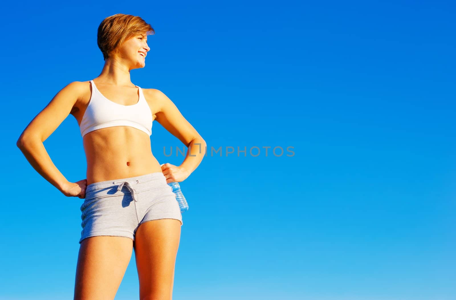 Fit Young Woman Working Out by cardmaverick
