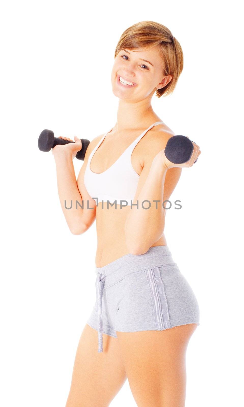 Young woman isolated on white lifting weights, from a complete series of photos.