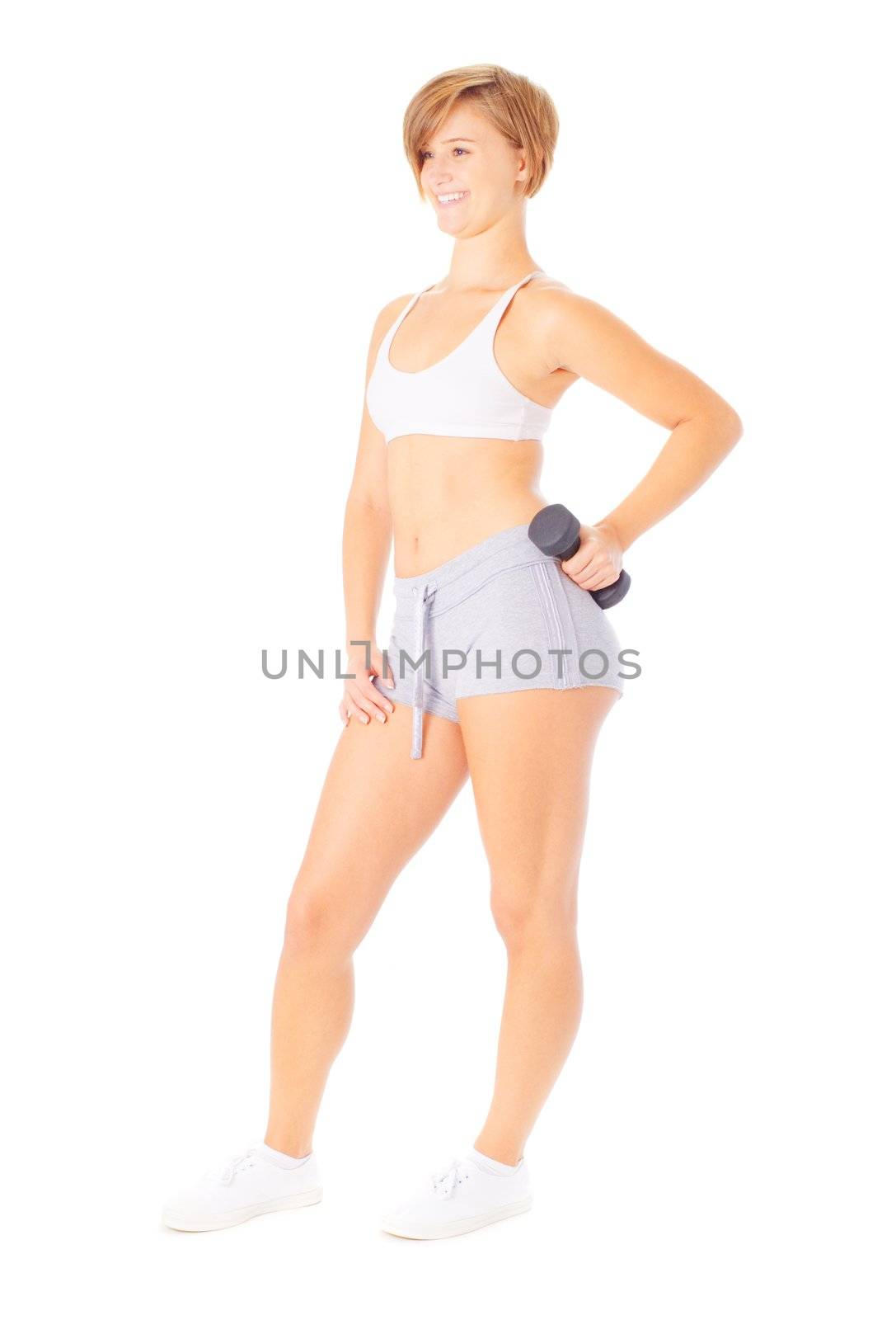 Young woman isolated on white lifting weights, from a complete series of photos.