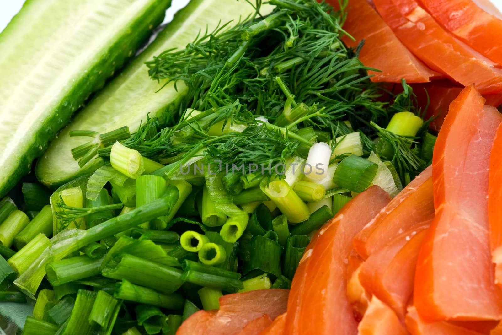 Sliced smoked chicken and vegetables on square porcelain plate onwhite backround
