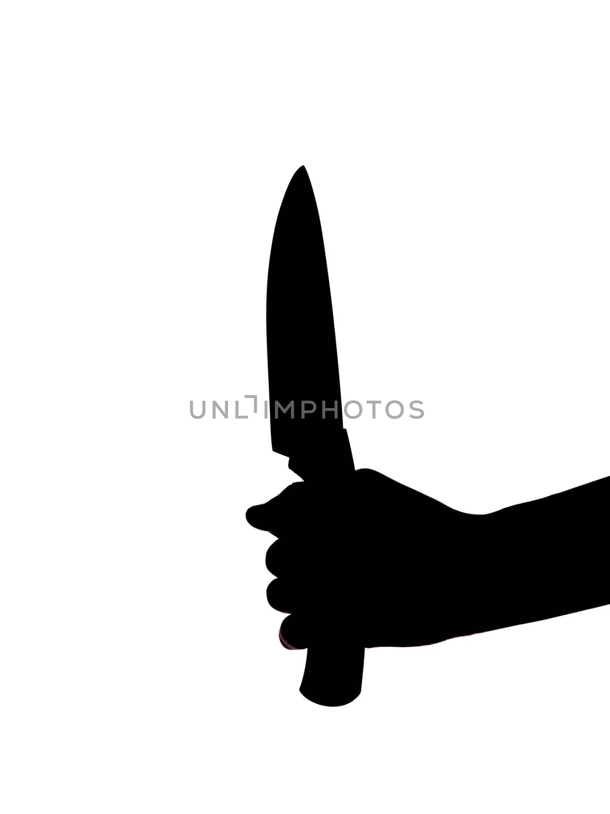 Silhouette og an hand holding a kitchen knife