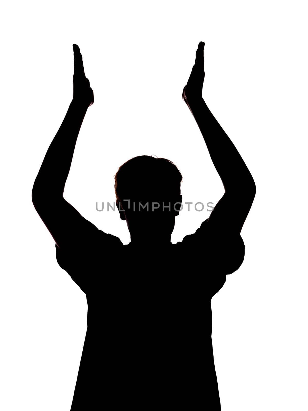 silhouette of a boy clapping his hands