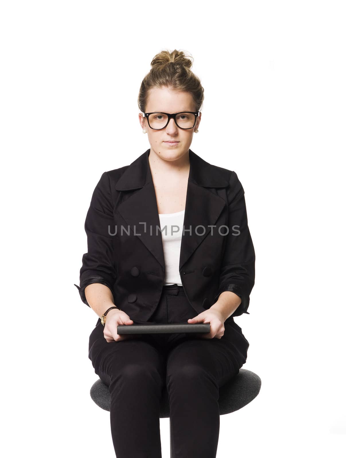 Buisnesswoman sitting on a chair by gemenacom