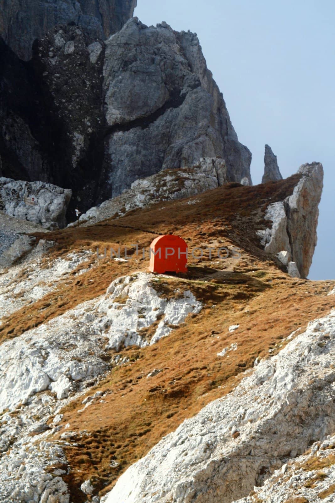 High mountain bivouac under Latemar cross peak, Trentino, Italy