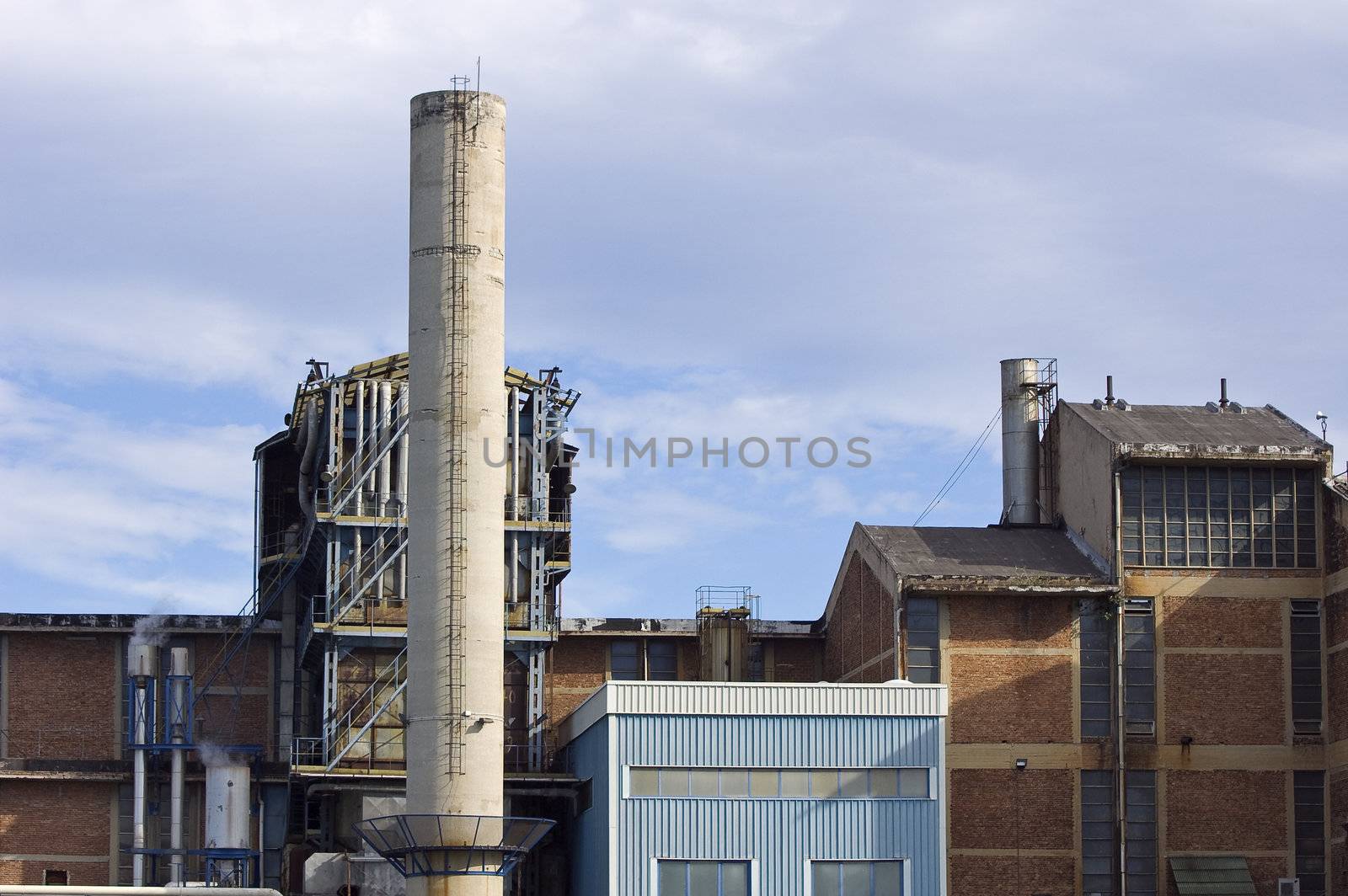 Detail of an industrial plant with a chimney