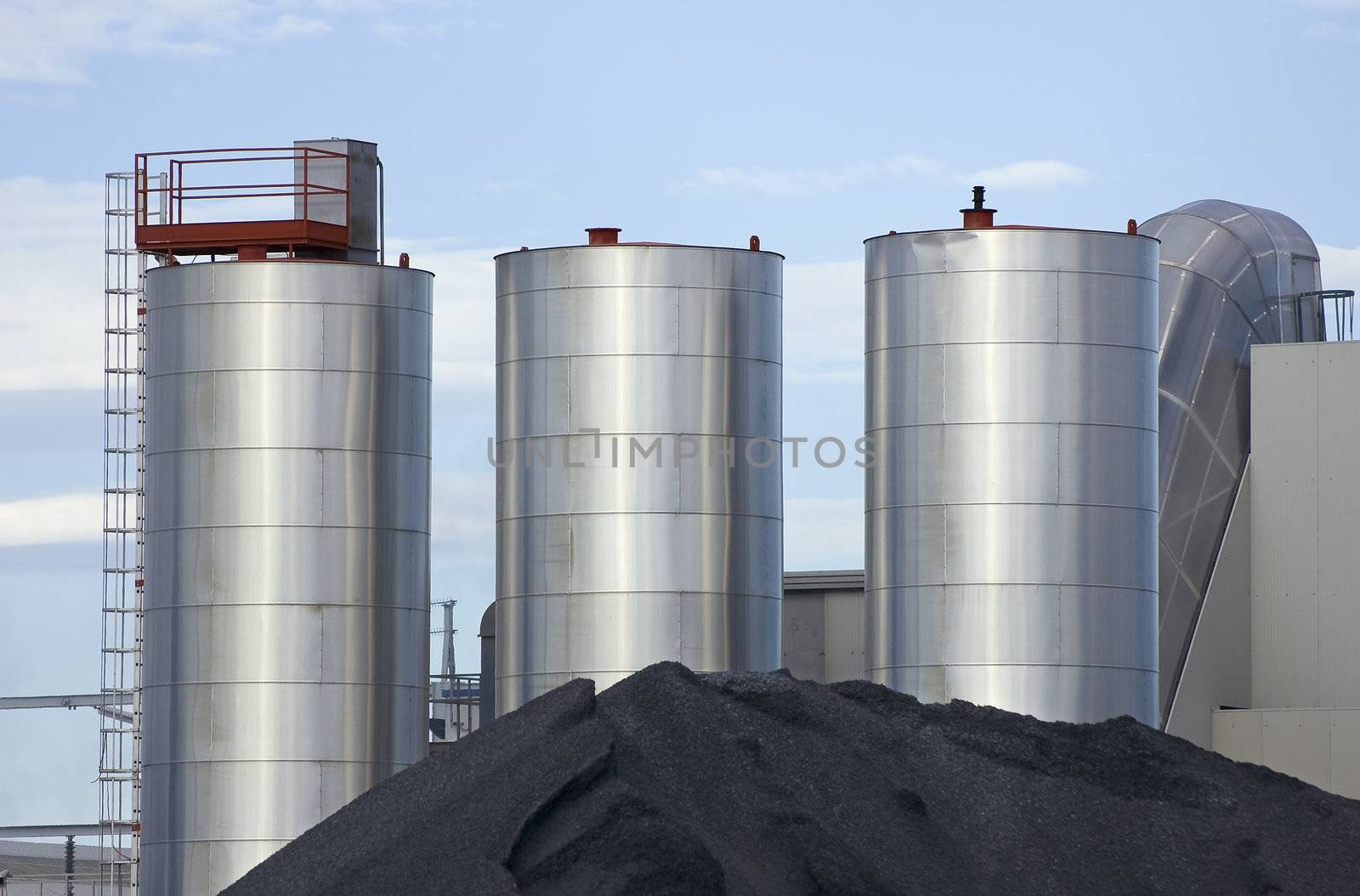 Metallic silos with stack of ground of an industrial plant