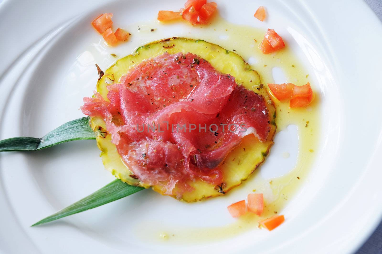 Thinly sliced tuna with pineapple dish