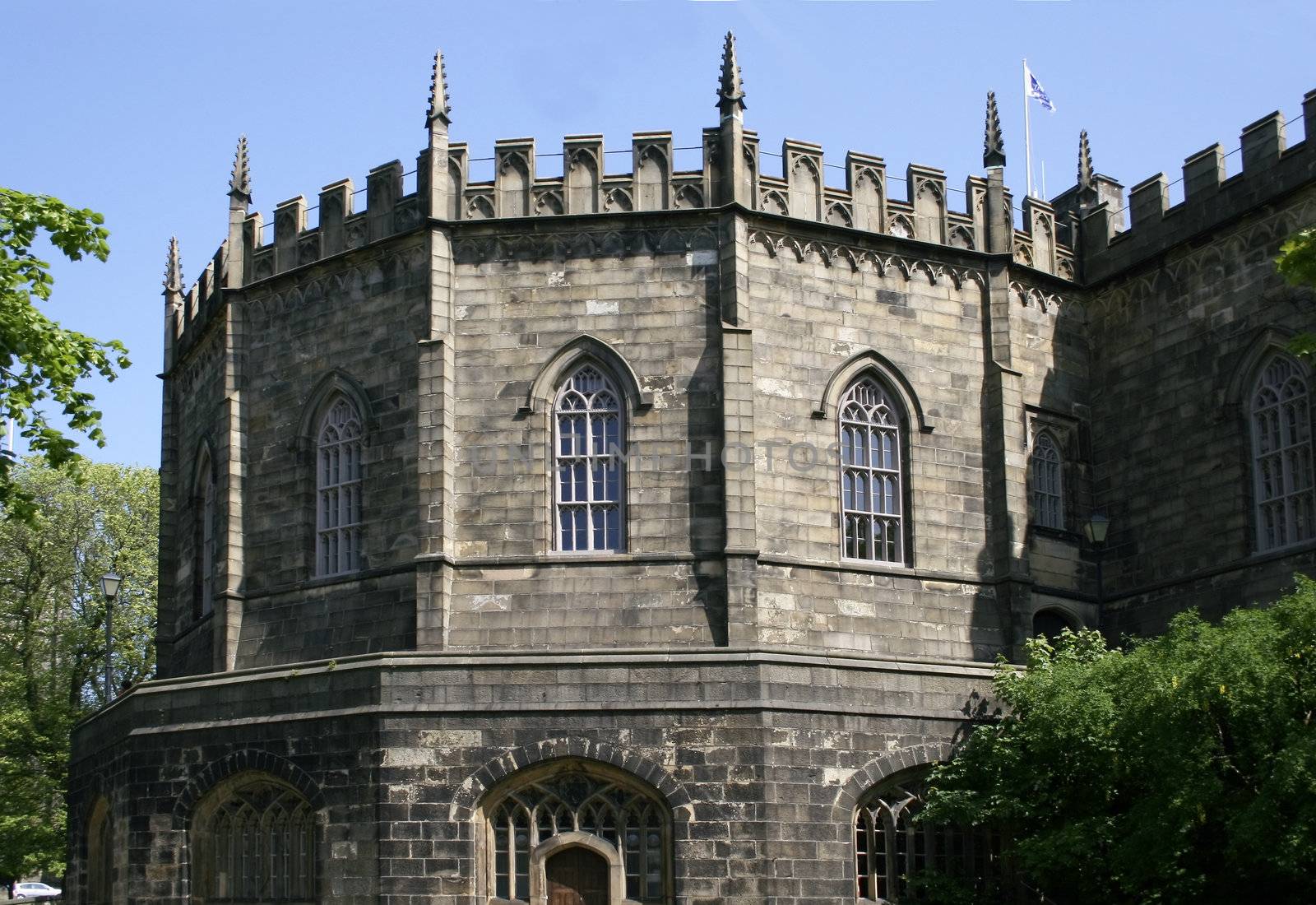 entrance of a old castle which is now used as a  prison 