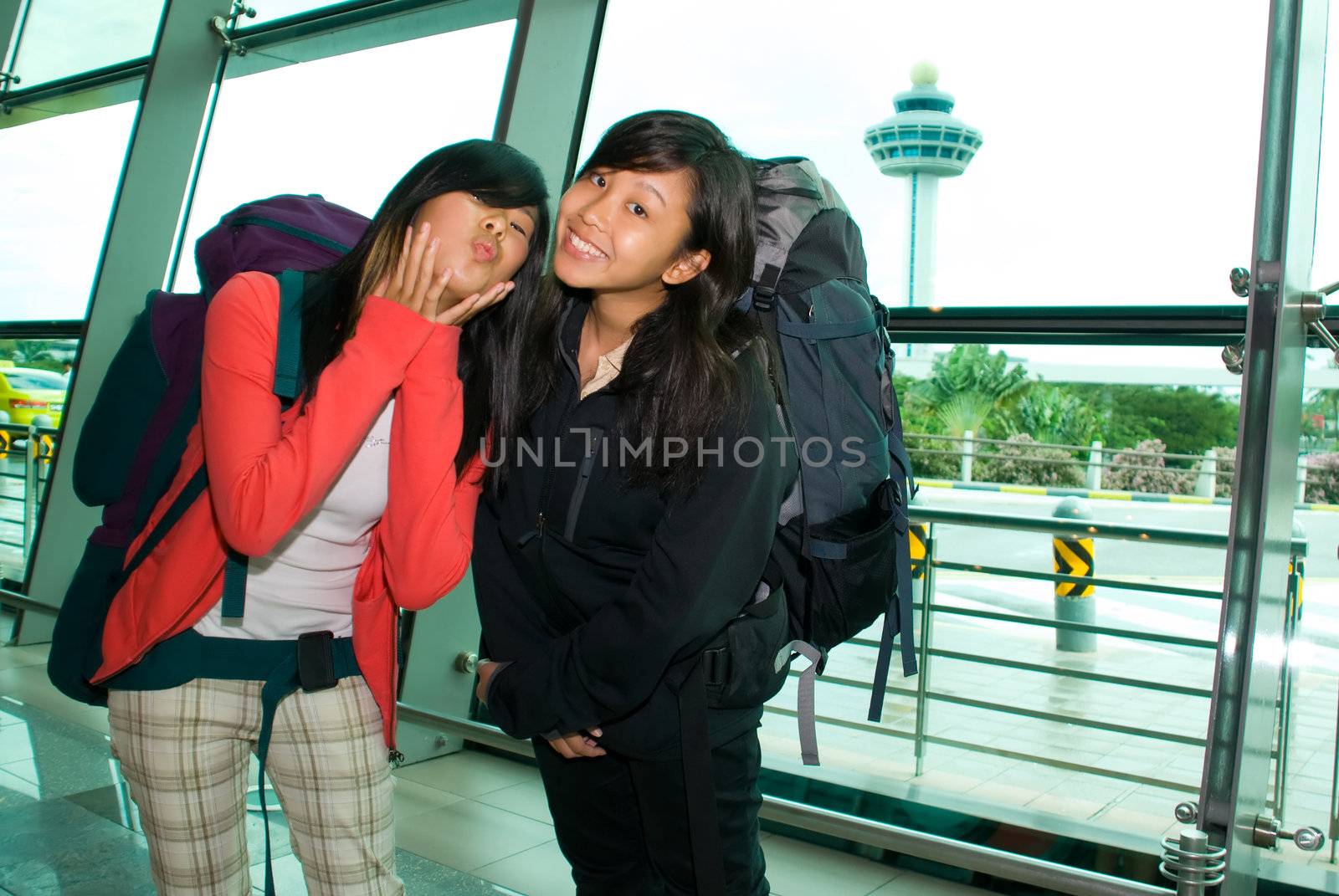 Making faces at the airport prior to departing.