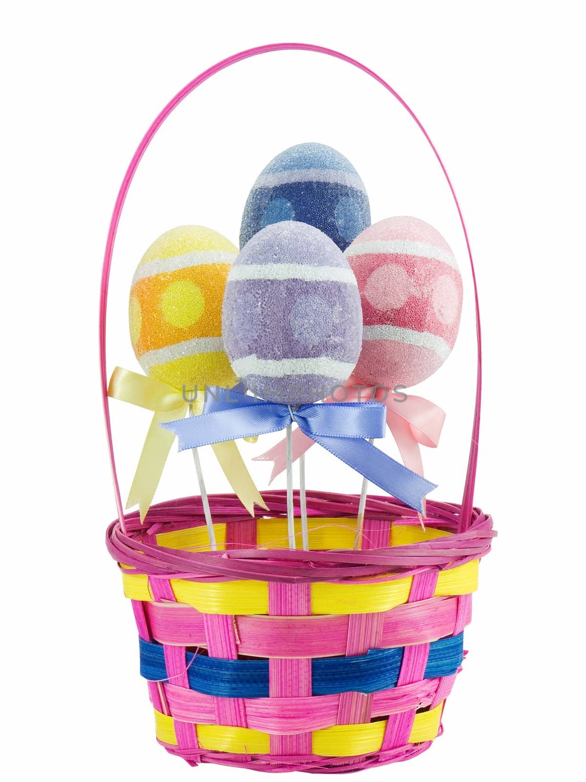 Easter basket with colored eggs in it, isolated on white