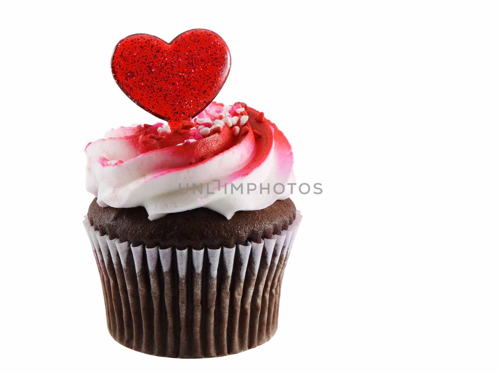 Cupcake with heart shape isolated on white