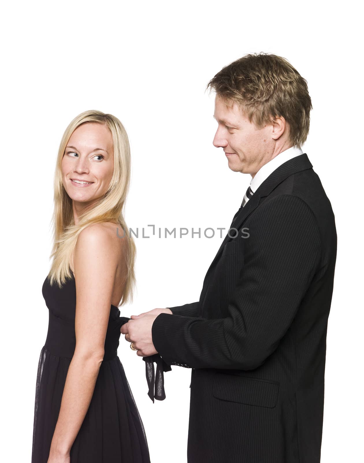 man helping woman to get dressed by gemenacom