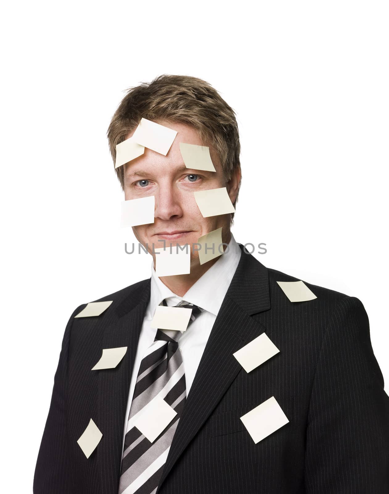 Man with postitnotes all over his face