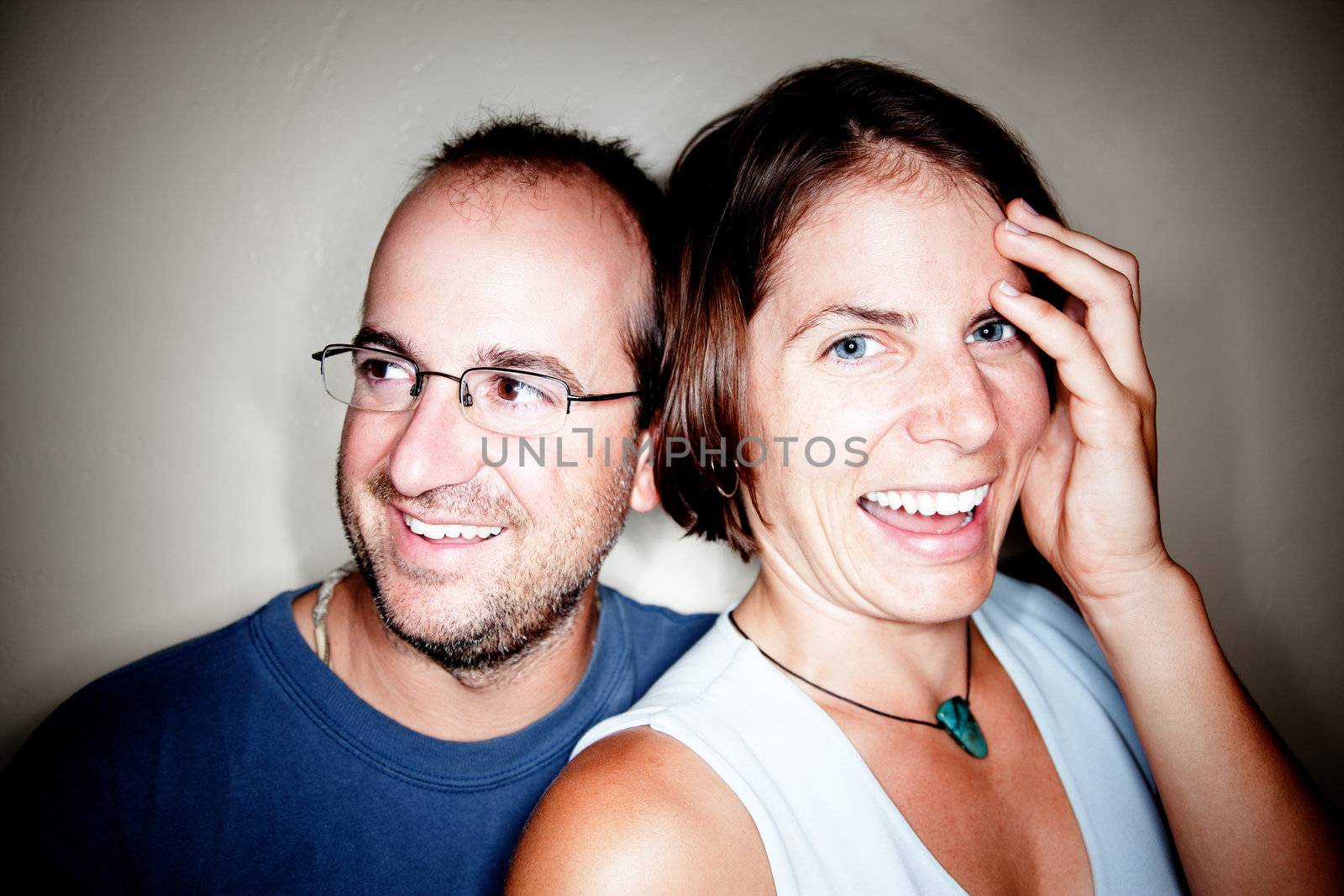 Attractive Man and Woman Smiling in Closeup Shot